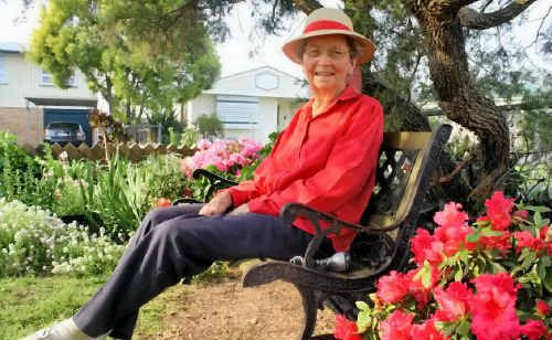 Merle Bamberry in her beautiful spring garden. Merle Bamberry in her beautiful spring garden.